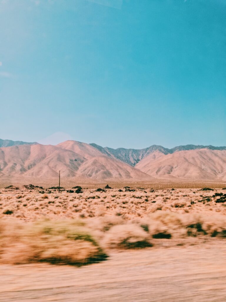 brown mountains under blue sky during daytime